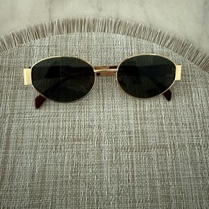 Amazon Gold Oval Sunglasses with Dark Lenses